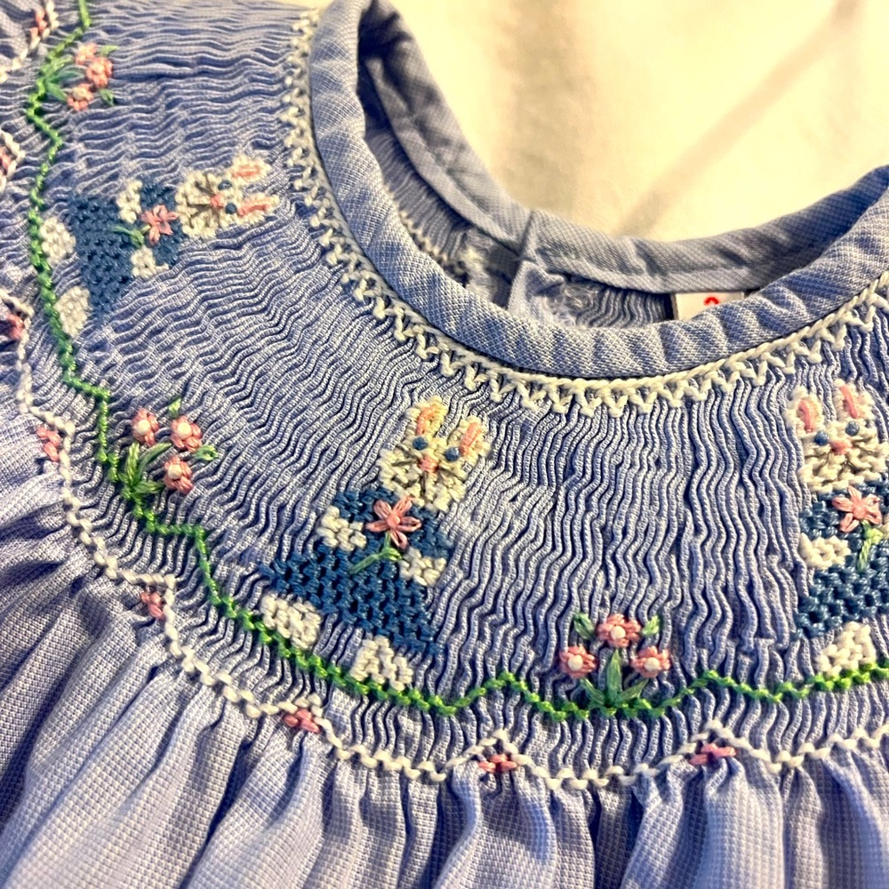 Adorable blue smocked bunny dress